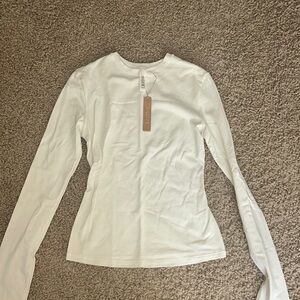 crème colored skims long sleeve (size small)